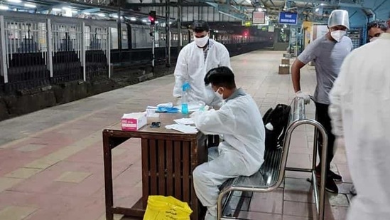 Covid-19 tests being administered to passengers arriving from Delhi, Goa, Rajasthan and Gujarat, at a railway station in Mumbai.(ANI) Covid-19 tests being administered to passengers arriving from Delhi, Goa, Rajasthan and Gujarat, at a railway station in Mumbai.(ANI)