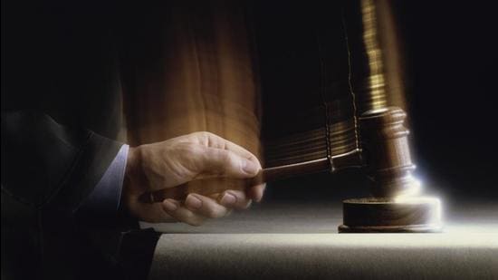Close-up of a judge handing down a verdict (Getty Images/Purestock) Close-up of a judge handing down a verdict (Getty Images/Purestock)