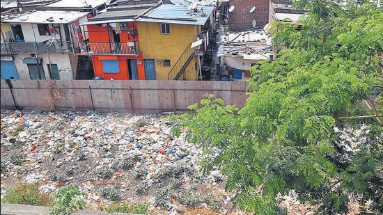 Pile of domestic garbage dumped at an open plot at Ambedkar chowk, Aundh, pose a health risk to residents. (HT) Pile of domestic garbage dumped at an open plot at Ambedkar chowk, Aundh, pose a health risk to residents. (HT)