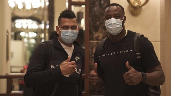 Andre Russell (right) and Sunil Narine arrive in Mumbai.(KKR)