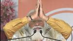 Prime Minister Narendra Modi during an election rally, ahead of West Bengal assembly polls at Kanthi in East Midnapore district on Wednesday. (PTI PHOTO.)