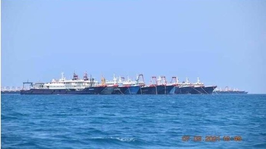 Some of the about 220 Chinese vessels reported by the Philippine Coast Guard at Whitsun Reef, South China Sea.(via REUTERS)