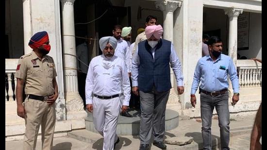 Suspended IG Paramraj Singh Umranangal coming out of the court of Faridkot judicial magistrate on Wednesday. (HT Photo)