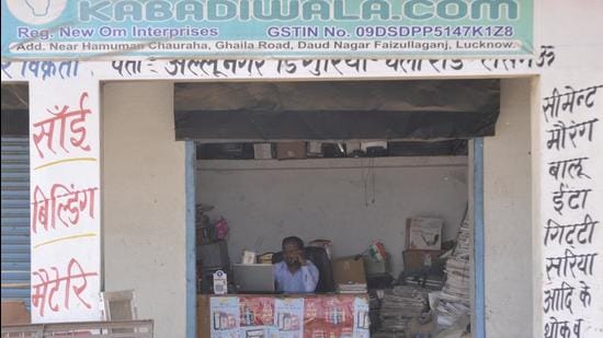 Om Prksh Prajapati at his scrap shop in Lucknow. (HT PHOTO)