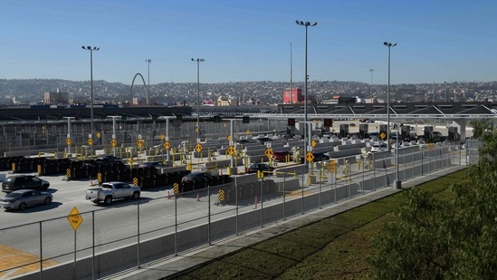 Vehicles enter a border checkpoint as they approach the Mexico border at the US Customs and Border Protection (CBP) San Ysidro Port of Entry at the US Mexico border in San Diego, California. (AFP) Vehicles enter a border checkpoint as they approach the Mexico border at the US Customs and Border Protection (CBP) San Ysidro Port of Entry at the US Mexico border in San Diego, California. (AFP)