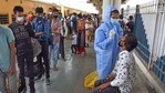 A BMC health worker takes an Antigen test of passengers arriving from Gujarat at Dadar station, in Mumbai on Thursday. (ANI) A BMC health worker takes an Antigen test of passengers arriving from Gujarat at Dadar station, in Mumbai on Thursday. (ANI)