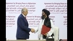 US Special Representative for Afghanistan Reconciliation Zalmay Khalilzad (L) and Taliban co-founder Mullah Abdul Ghani Baradar (R) shake hands after signing the peace agreement between US, Taliban, Doha, 29, 2020 (Anadolu Agency via Getty Images) US Special Representative for Afghanistan Reconciliation Zalmay Khalilzad (L) and Taliban co-founder Mullah Abdul Ghani Baradar (R) shake hands after signing the peace agreement between US, Taliban, Doha, 29, 2020 (Anadolu Agency via Getty Images)