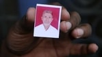 A relative holds a photograph of slain Indian villager Mohammad Akhlaq at his home in the village of Bisada, some 35 kilometres (22 miles) north-east of New Delhi.(AFP Photo) A relative holds a photograph of slain Indian villager Mohammad Akhlaq at his home in the village of Bisada, some 35 kilometres (22 miles) north-east of New Delhi.(AFP Photo)