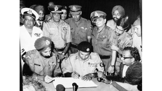 Pakistan’s Gen. Niazi signs the surrender document as chief of India’s Eastern command Gen. Aurora looks on surrounded by other commanders in Dacca, Bangladesh, on December 16, 1971. The war would rage until December when India joined on the side of Bangladesh. Finally, on December 16, 1971, Pakistan forces surrendered and Bangladesh celebrated its freedom.(AP)