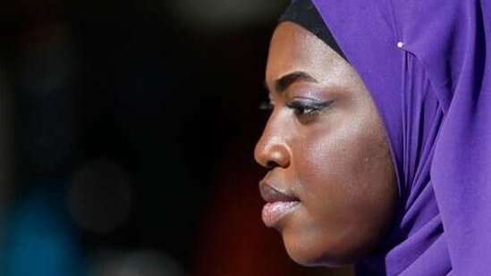 Influencer Aida Diouf Mbengue poses for a portrait, in Milan, Italy, Tuesday, March 16, 2021. Mbengue, 19, from Senegal, is making a name for herself as a self-billed Afro-Influencer, one of a group of young people in Italy of African origin who have come together to try to increase their influence in social media. (AP) Influencer Aida Diouf Mbengue poses for a portrait, in Milan, Italy, Tuesday, March 16, 2021. Mbengue, 19, from Senegal, is making a name for herself as a self-billed Afro-Influencer, one of a group of young people in Italy of African origin who have come together to try to increase their influence in social media. (AP)