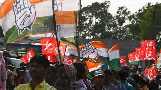 Activists of the Congress and the Left parties participate in the last campaign rally for the United Front candidate before the first phase of West Bengal's state legislative assembly election in Purulia, some 325 km west of Kolkata on March 25, 2021. (AFP)