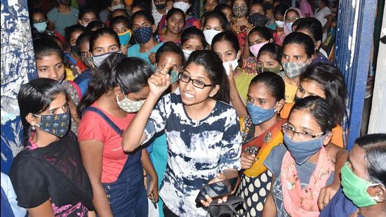 Students of Osmania University Women's hostel stage a protest demanding that hostels remain open and provide full facilities to continue classes in Hyderabad on Wednesday. (PTI PHOTO.) Students of Osmania University Women's hostel stage a protest demanding that hostels remain open and provide full facilities to continue classes in Hyderabad on Wednesday. (PTI PHOTO.)