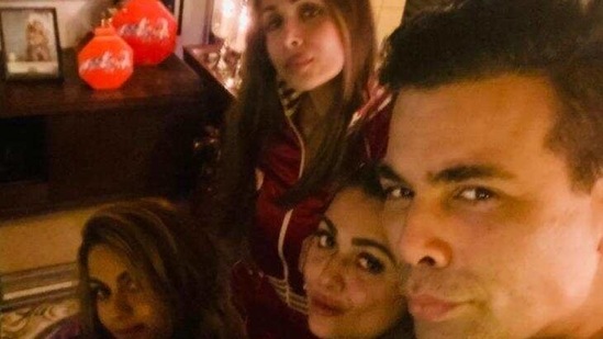 Karan Johar parties with his close friends. Karan Johar parties with his close friends.