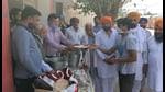 Locals serving langar to train passengers at Tapa railway station. Locals serving langar to train passengers at Tapa railway station.