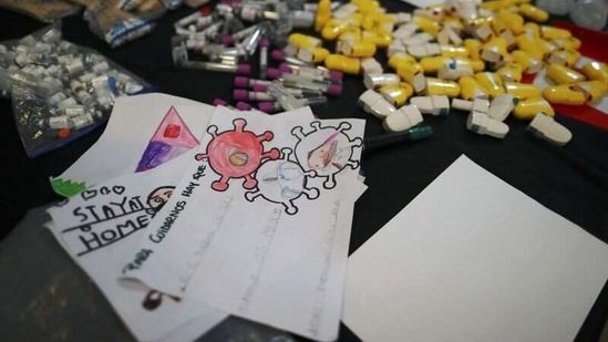 Drawings and medical supplies that will be part of the "Museum of the After" are pictured at the workshop of Argentine artist Marcelo Toledo in Buenos Aires, Argentina March 4, 2021. (REUTERS)