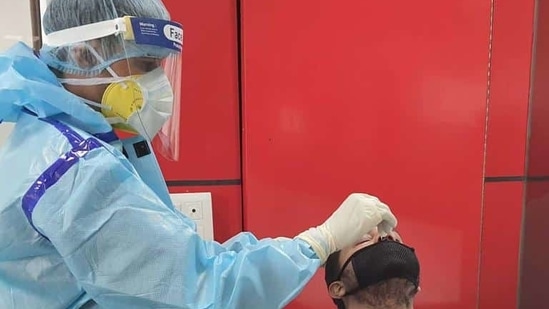 File photo: Health department workers taking sample of Covid-19. (HT photo) File photo: Health department workers taking sample of Covid-19. (HT photo)