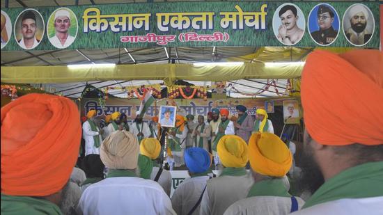 Farmers congregate during a felicitation ceremony by Bharatiya Kisan Union amid the ongoing protest against the new farm laws, at Ghazipur (Delhi-UP border), near Ghaziabad. (Sakib Ali/HT Photo) Farmers congregate during a felicitation ceremony by Bharatiya Kisan Union amid the ongoing protest against the new farm laws, at Ghazipur (Delhi-UP border), near Ghaziabad. (Sakib Ali/HT Photo)