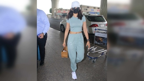 To accessorise the look a little and give it a street style vibe, she stepped into a pair of white sneakers and was seen wearing a grey bucket cap.(Varinder Chawla)