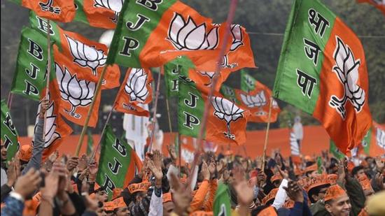 File photo: Bharatiya Janta Party (BJP) supporters wave party flags during a rally. (Burhaan Kinu/HT PHOTO) File photo: Bharatiya Janta Party (BJP) supporters wave party flags during a rally. (Burhaan Kinu/HT PHOTO)