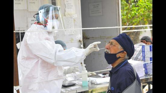 A Chandigarh resident’s sample being collected for the RT-PCR test for Covid-19. The UT has seen a significant surge in new cases recently. (HT Photo)