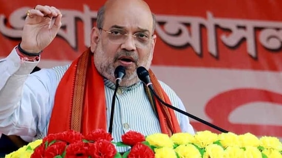 Union Home Minister Amit Shah addresses during a public meeting at Shantipur village in East Midnapore on Thursday. (ANI PHOTO.)