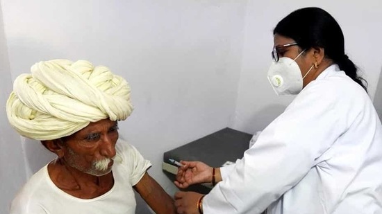 A senior citizen gets his Covid-19 vaccine shot at a government hospital in a village near Ajmer, Rajasthan. (File photo)