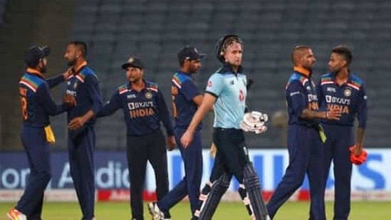 England's Liam Livingstone, third right, walks off the field after their win.(AP)