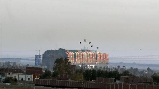 Ever Given, one of the world's largest container ships, ran aground in Suez Canal, Egypt. (REUTERS)