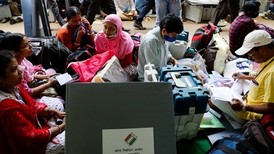 Polling officers check election material before leaving for their respective stations ahead of the first phase of elections in West Bengal state in Medinipur, India, Friday, March 26, 2021. The eight0phased elections in the state are scheduled to begin on March 27. (AP Photo/Bikas Das)(AP)