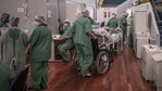 Healthcare workers treat Covid-19 patients inside a field hospital at the Pedro Dell'Antonia sports complex in Santo Andre, Brazil.(Bloomberg) Healthcare workers treat Covid-19 patients inside a field hospital at the Pedro Dell'Antonia sports complex in Santo Andre, Brazil.(Bloomberg)