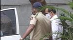 Police officer Sachin Vaze being taken to a court by National Investigation Agency (NIA) for a hearing on Thursday in connection with a probe into the recovery of explosives from a car parked near business tycoon Mukesh Ambani's house in Mumbai. (Bhushan Koyande/ HT Photo) Police officer Sachin Vaze being taken to a court by National Investigation Agency (NIA) for a hearing on Thursday in connection with a probe into the recovery of explosives from a car parked near business tycoon Mukesh Ambani's house in Mumbai. (Bhushan Koyande/ HT Photo)