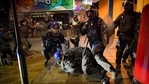 Ten people were arrested by the Bristol City Police, said the Avon and Somerset Police in an official press release. (Ben Birchall/PA via AP)(AP) Ten people were arrested by the Bristol City Police, said the Avon and Somerset Police in an official press release. (Ben Birchall/PA via AP)(AP)
