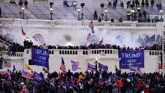 Violent rioters, loyal to Donald Trump, storm the Capitol in Washington.(AP / File)