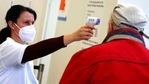 Medical staff takes the temperature of an elderly man arriving at a local vaccination centre as the spread of the coronavirus disease (Covid-19) continues in Ebersberg near Munich, Germany.(AP file photo) Medical staff takes the temperature of an elderly man arriving at a local vaccination centre as the spread of the coronavirus disease (Covid-19) continues in Ebersberg near Munich, Germany.(AP file photo)