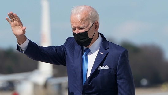 U.S. President Joe Biden waves while boarding Air Force One as he departs Washington for travel to Wiilmington, Delaware at Joint Base Andrews, Maryland, U.S., March 26, 2021. REUTERS/Joshua Roberts(REUTERS)