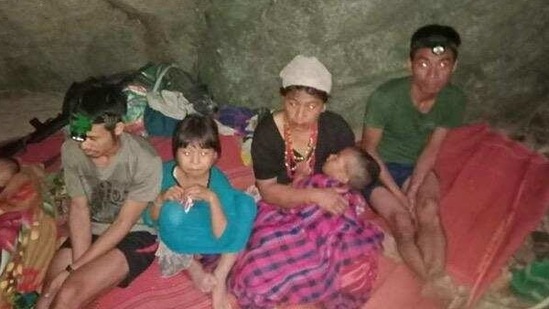 Ethnic Karen villagers displaced from Myanmar's Day Pu Noh village are seen in an unknown location in Karen state, after fleeing Burmese army air strikes. (Free Burma Rangers/via Reuters)