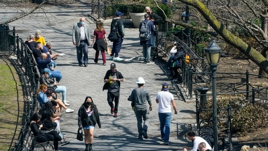 People enjoy lunch hour in Union Square in New York. A year after becoming a global epicenter of the coronavirus pandemic, New York and New Jersey are back atop the list of US states with the highest rates of infection. (AP) People enjoy lunch hour in Union Square in New York. A year after becoming a global epicenter of the coronavirus pandemic, New York and New Jersey are back atop the list of US states with the highest rates of infection. (AP)