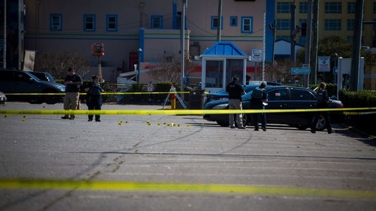 Virginia Beach police work the scene of a shooting the night before on Saturday, March 27, 2021 in Virginia Beach, Va. (AP Photo ) Virginia Beach police work the scene of a shooting the night before on Saturday, March 27, 2021 in Virginia Beach, Va. (AP Photo )