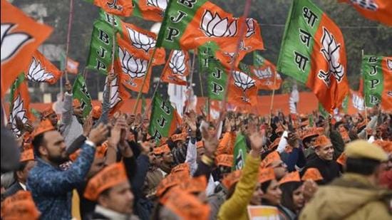 File photo: Bharatiya Janta Party (BJP) supporters wave party flags during a rally. (Burhaan Kinu/HT PHOTO) File photo: Bharatiya Janta Party (BJP) supporters wave party flags during a rally. (Burhaan Kinu/HT PHOTO)