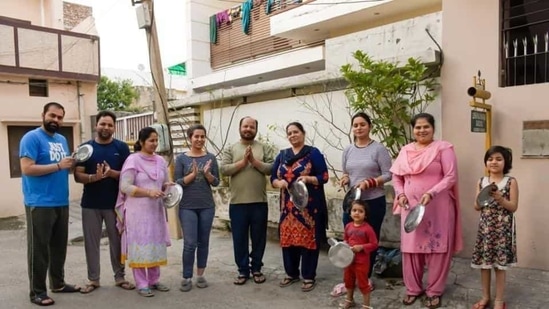 People standing in front of their house and participating in Janta curfew clapping initiative. (HT File Photo/Satish Bate) People standing in front of their house and participating in Janta curfew clapping initiative. (HT File Photo/Satish Bate)
