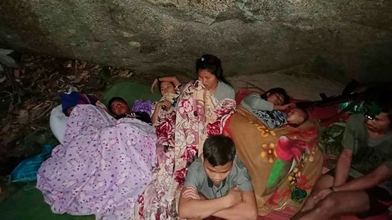 In this photo provided by Free Burma Rangers, villagers shelter in the open due to airstrikes, Saturday, March 27, 2021, in Deh Bu Noh, in Karen state, Myanmar. Myanmar military jets hit a village in Karen State, on Saturday night, killing a few people and wounding others, according to relief organizations.(Free Burma Rangers via AP) (AP) In this photo provided by Free Burma Rangers, villagers shelter in the open due to airstrikes, Saturday, March 27, 2021, in Deh Bu Noh, in Karen state, Myanmar. Myanmar military jets hit a village in Karen State, on Saturday night, killing a few people and wounding others, according to relief organizations.(Free Burma Rangers via AP) (AP)