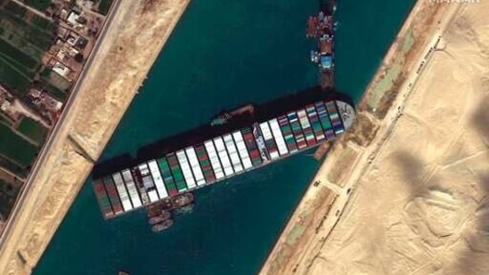 This satellite image from Maxar Technologies shows the cargo ship MV Ever Given stuck in the Suez Canal near Suez, Egypt, Saturday, March 27, 2021. Authorities are preparing to make new attempts to free the giant container vessel stuck in Egypt's Suez Canal for a fifth day and reopen a crucial east-west waterway for global shipping. (©Maxar Technologies via AP)(AP)