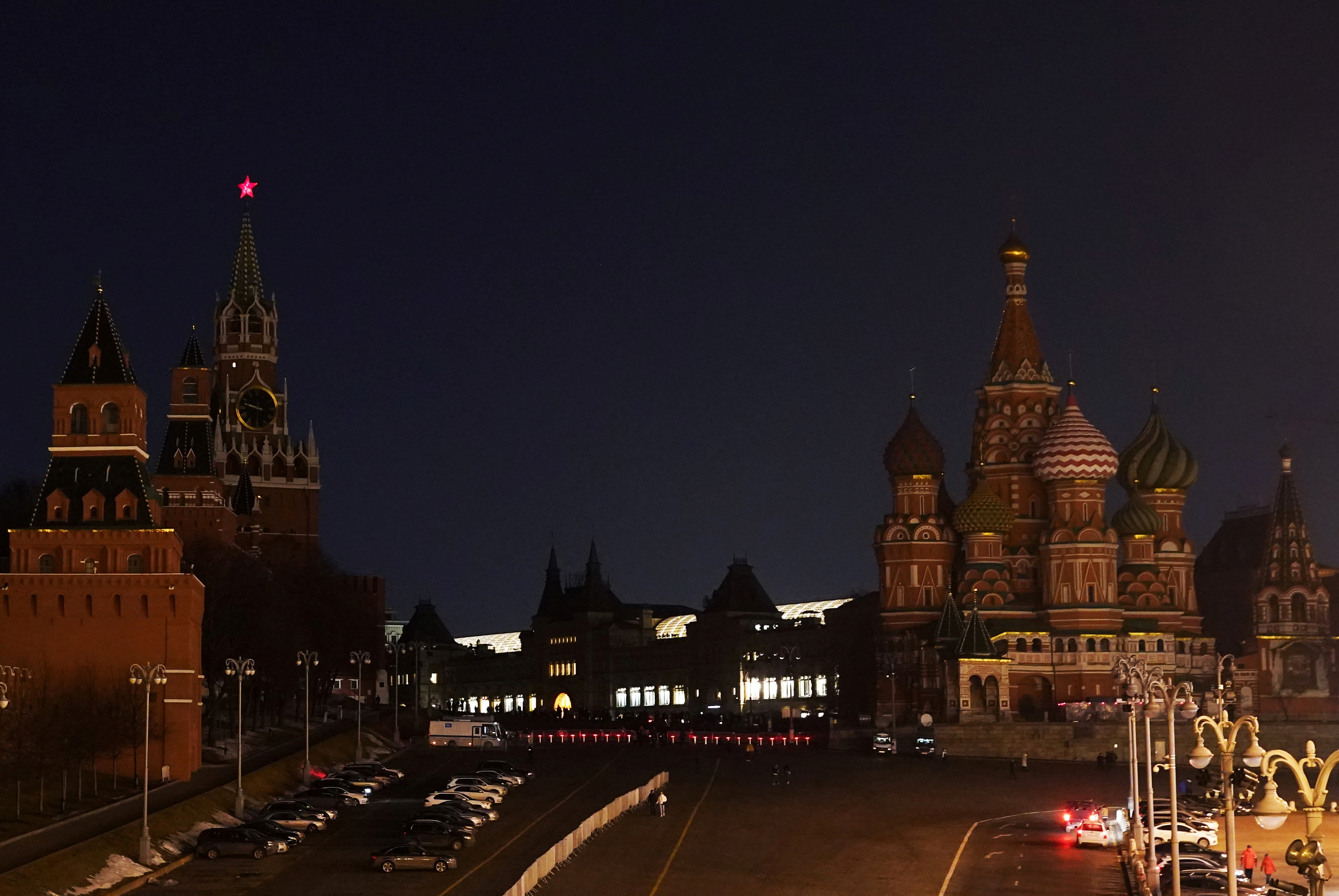 A view shows the Kremlin, the GUM department store and the St. Basil's Cathedral after the lights are switched off for Earth Hour in Moscow, Russia. (Reuters)