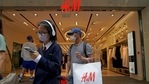 A man shops at an H&M clothing store in Hong Kong, Saturday, March 27, 2021. H&M disappeared from the internet in China as the government raised pressure on shoe and clothing brands and announced sanctions Friday, March 26, 2021, against British officials in a spiraling fight over complaints of abuses in the Xinjiang region. (AP Photo/Kin Cheung)(AP) A man shops at an H&M clothing store in Hong Kong, Saturday, March 27, 2021. H&M disappeared from the internet in China as the government raised pressure on shoe and clothing brands and announced sanctions Friday, March 26, 2021, against British officials in a spiraling fight over complaints of abuses in the Xinjiang region. (AP Photo/Kin Cheung)(AP)