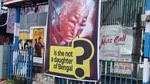 A poster saying, 'Is she not a daughter of Bengal' installed after beaten up to the death of BJP cadre Gopal Majumdar's 85-year-old mother at Garia ghat crossing, in Kolkata on Monday. (ANI Photo) A poster saying, 'Is she not a daughter of Bengal' installed after beaten up to the death of BJP cadre Gopal Majumdar's 85-year-old mother at Garia ghat crossing, in Kolkata on Monday. (ANI Photo)