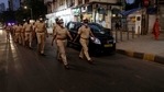 Police officials conduct a flag march during the night curfew imposed by the authorities following the rise in COVID-19 cases in Mumbai, India, Sunday, March 28, 2021. (AP) Police officials conduct a flag march during the night curfew imposed by the authorities following the rise in COVID-19 cases in Mumbai, India, Sunday, March 28, 2021. (AP)