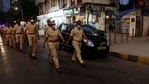 Police officials conduct a flag march during the night curfew imposed by the authorities following the rise in COVID-19 cases in Mumbai, India, Sunday, March 28, 2021. (AP) Police officials conduct a flag march during the night curfew imposed by the authorities following the rise in COVID-19 cases in Mumbai, India, Sunday, March 28, 2021. (AP)