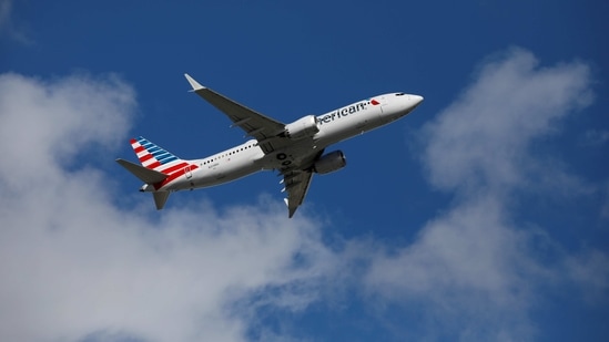 Falling infections and hospitalizations and rising vaccinations have spurred demand after a blow early this year when the US required negative coronavirus tests for international travelers, American Airlines said. In picture - American Airlines flight 718.(Reuters)