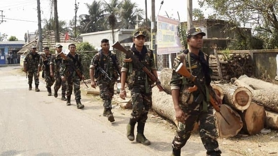 Police personnel patrol a street ahead of West Bengal Assembly Elections in Nandigram on Sunday, March 28, 2021. (PTI)