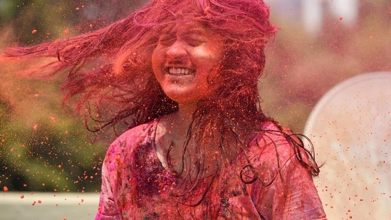 Mumbai: A girl drenched in colours during 'Holi' festival amid spike in COVID-19 cases, in Mumbai, Monday, March 29, 2021. (PTI)